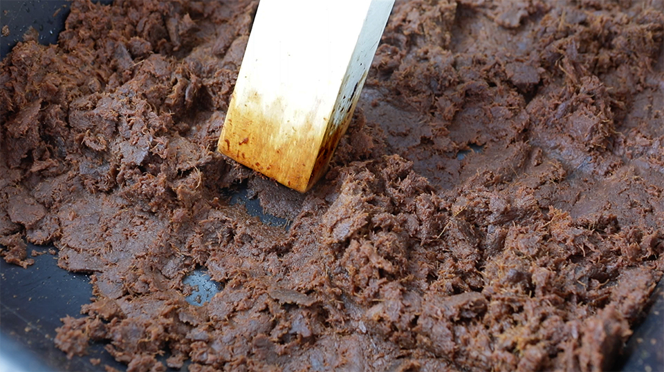 Crushing Cooked Agave